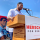 Republican Senate candidate Herschel Walker campaigns Sept. 7, 2021, in Emerson, Ga. Georgia voters will see at least one fall debate between Sen. Raphael Warnock and Republican challenger Herschel Walker. Warnock on Tuesday evening accepted Walker’s proposal for an Oct. 14 debate in Savannah.